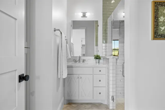 a view of a kitchen with a sink cabinets and wooden floor