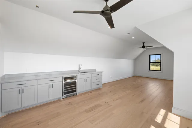 a view of a storage & utility room with wooden floor