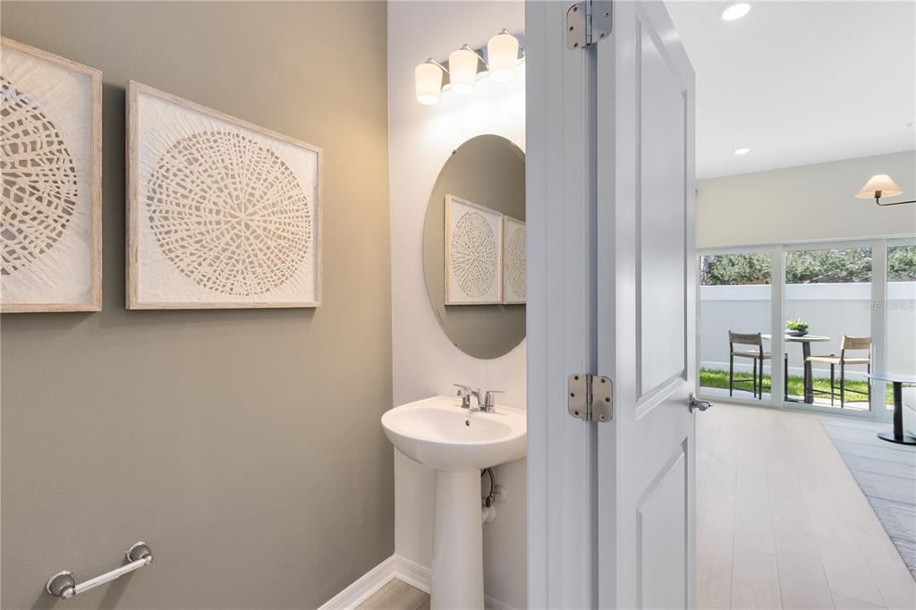 4337 Jetty Lane Northeast Palm Bay, FL 32905 - Photo 16 of 31 a bathroom with a sink a mirror and shower