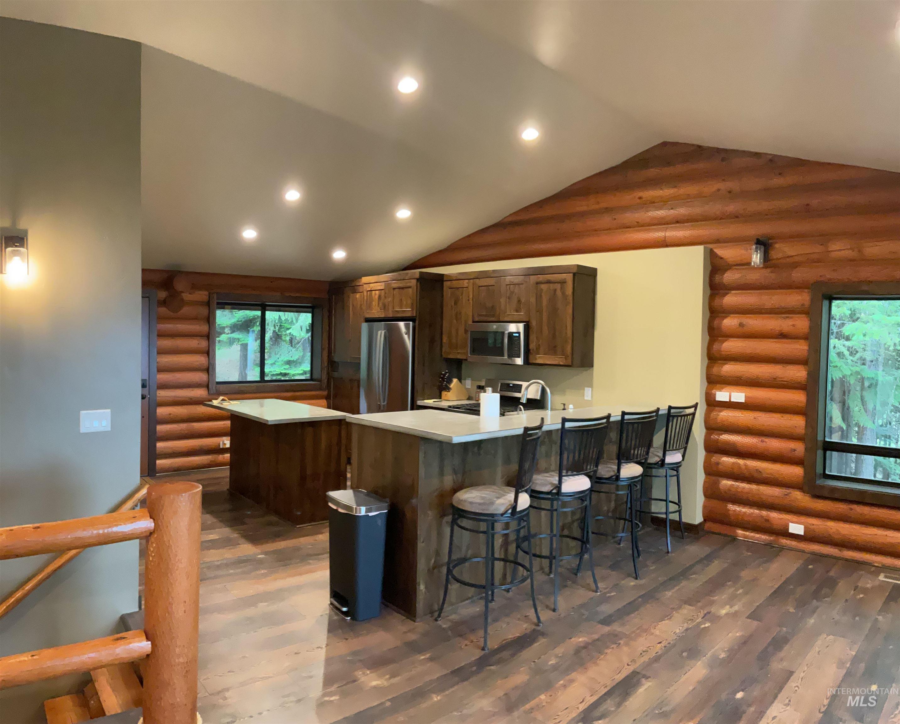 6125 Freeman Creek Road Lenore, ID 83541 - Photo 9 of 44 Spacious kitchen featuring wood cabinetry, stainless steel appliances, and light countertops