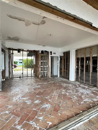 a view of a room with large windows