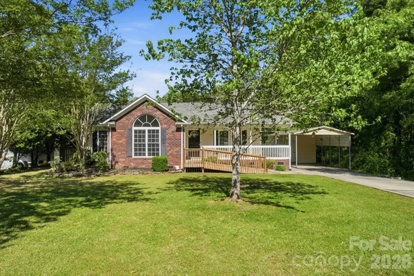 a house view with a outdoor space