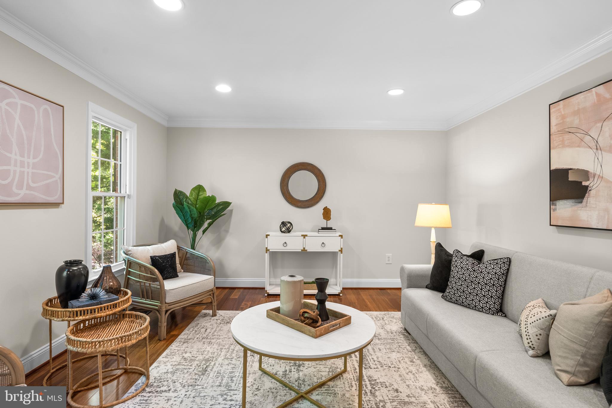 10717 Midsummer Drive Reston, VA 20191 - Photo 7 of 35 a living room with furniture a rug and a window
