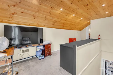 a view of a living room and a window