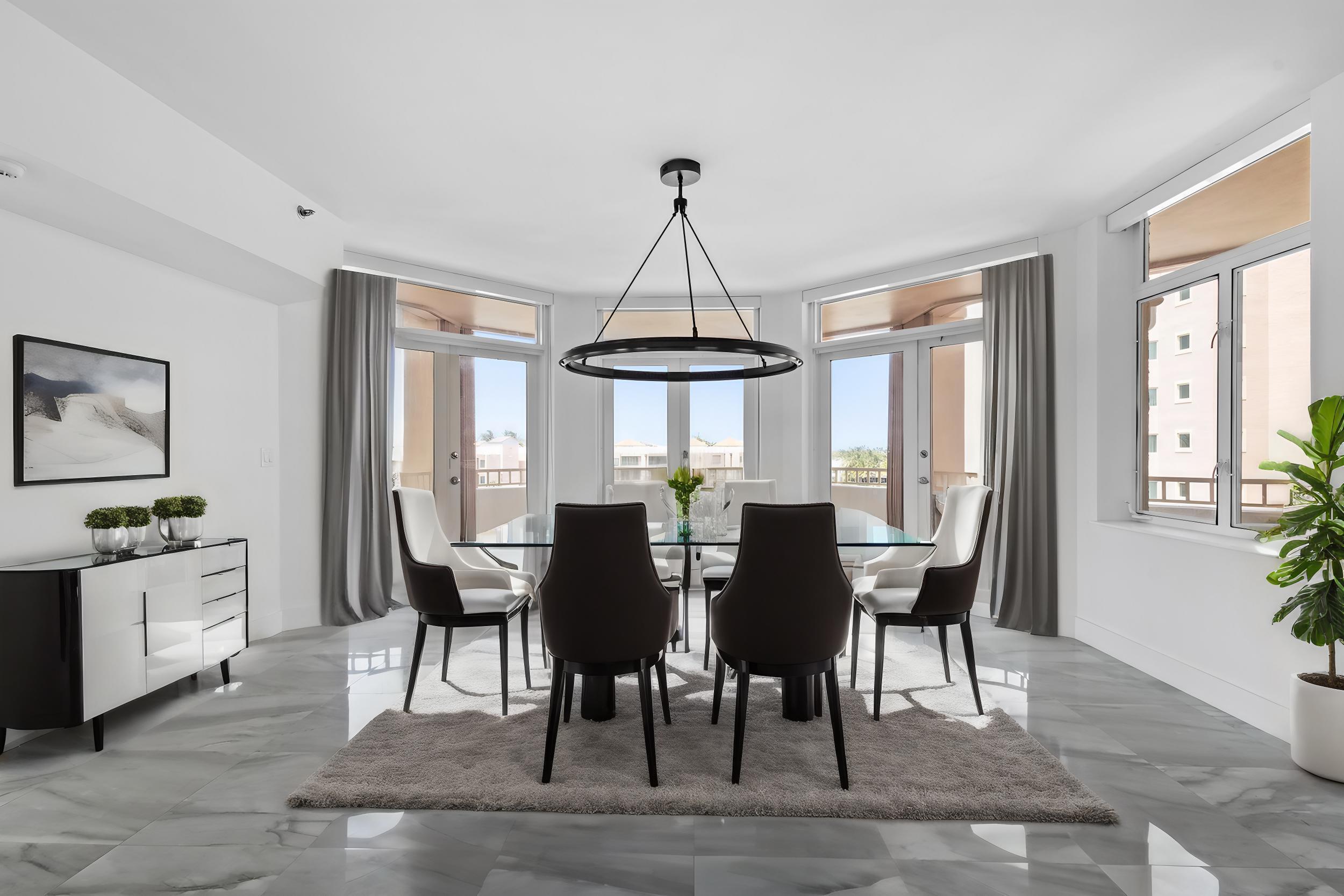 300 Southeast 5th Avenue, Unit 5180 Boca Raton, FL 33432 - Photo 3 of 45 a view of a dining room with furniture window and wooden floor