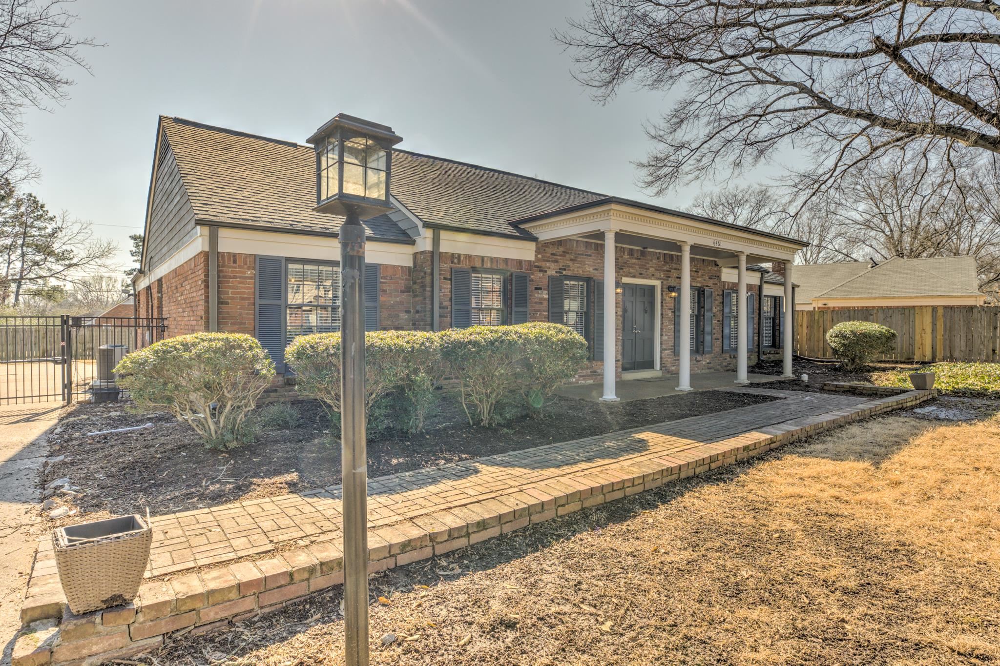 6461 Messick Road Memphis, TN 38119 - Photo 2 of 25 Brick Flower Beds in Front and some in Back, Lamp Post is LED at Night, Porch Lights are Night Time Activated