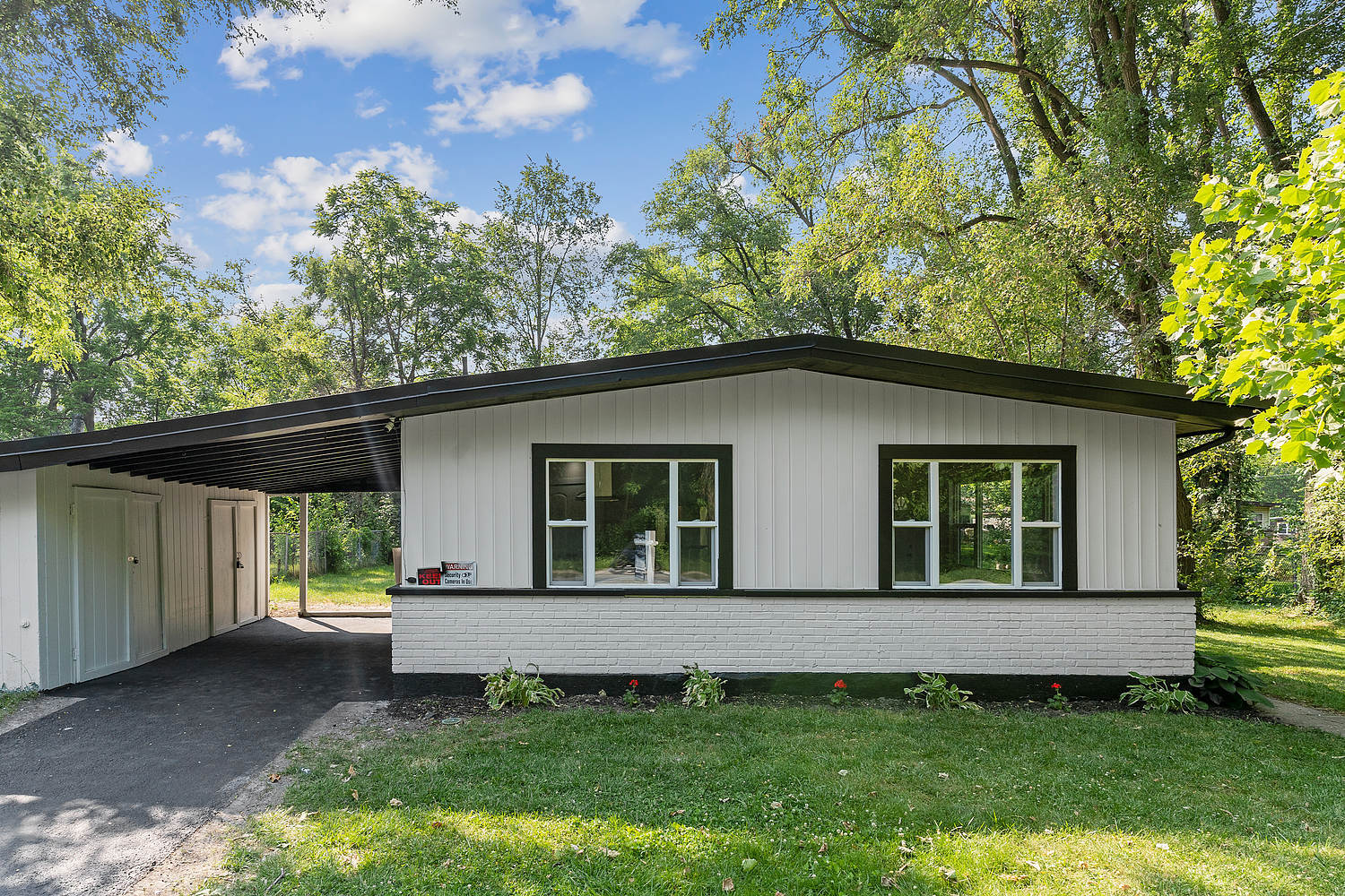 Undisclosed Address Park Forest, IL 60466 - Photo 1 of 16 a view of a house with a yard