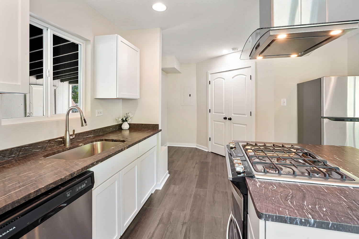Undisclosed Address Park Forest, IL 60466 - Photo 3 of 16 a kitchen with granite countertop a sink stove and refrigerator