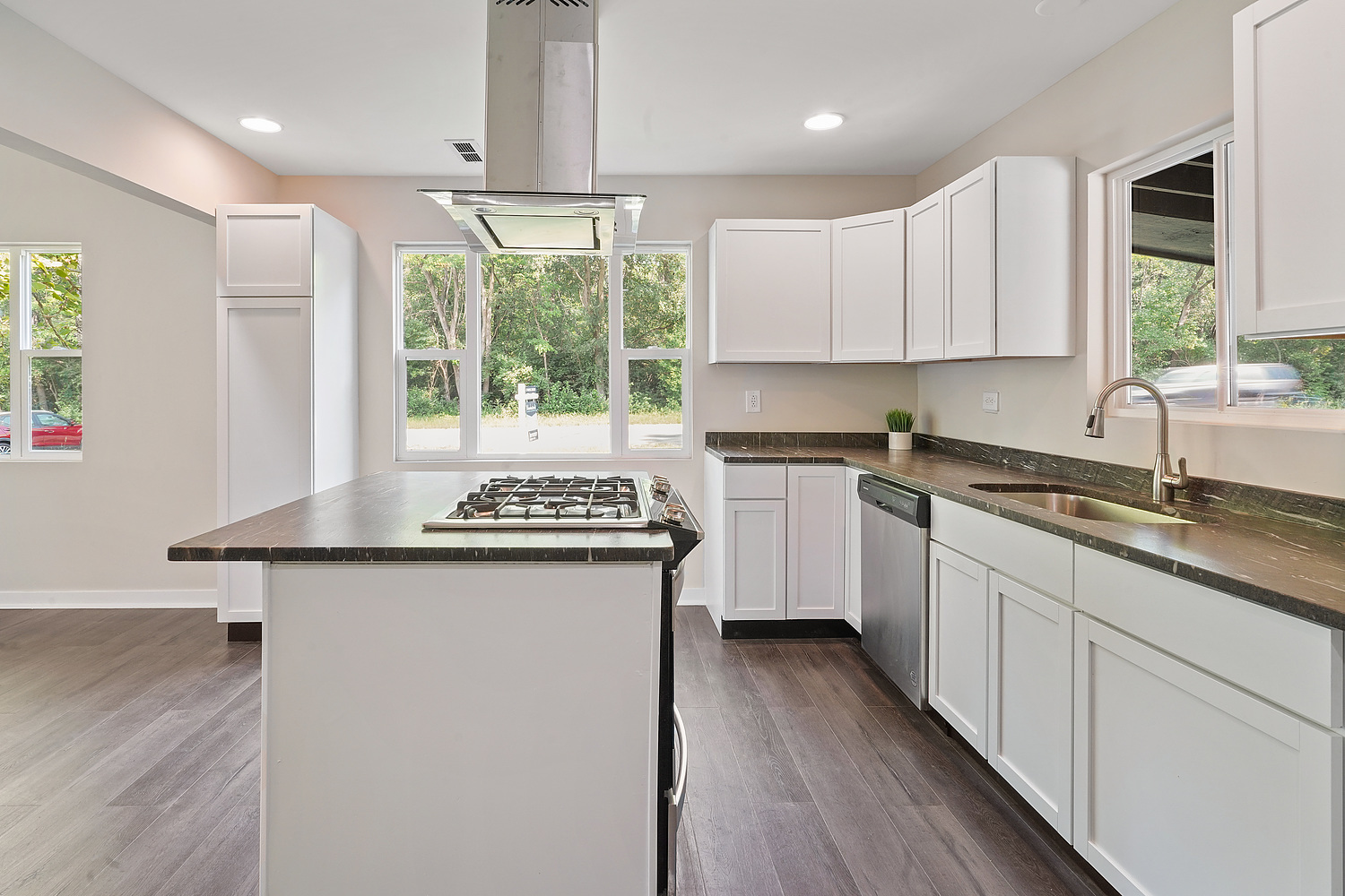 Undisclosed Address Park Forest, IL 60466 - Photo 4 of 16 a kitchen with granite countertop a sink and a stove top oven
