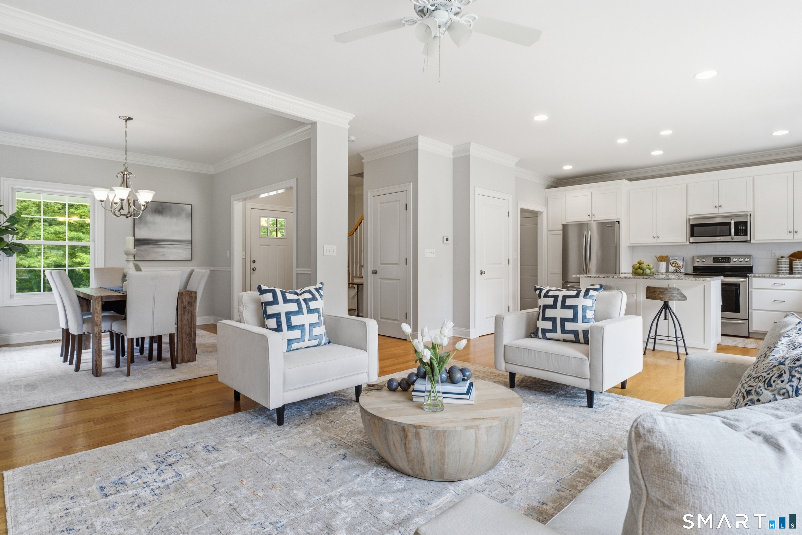 838 Little Meadow Road Guilford, CT 06437 - Photo 6 of 40 The dining room flows right into the family room which is open to the kitchen as well.