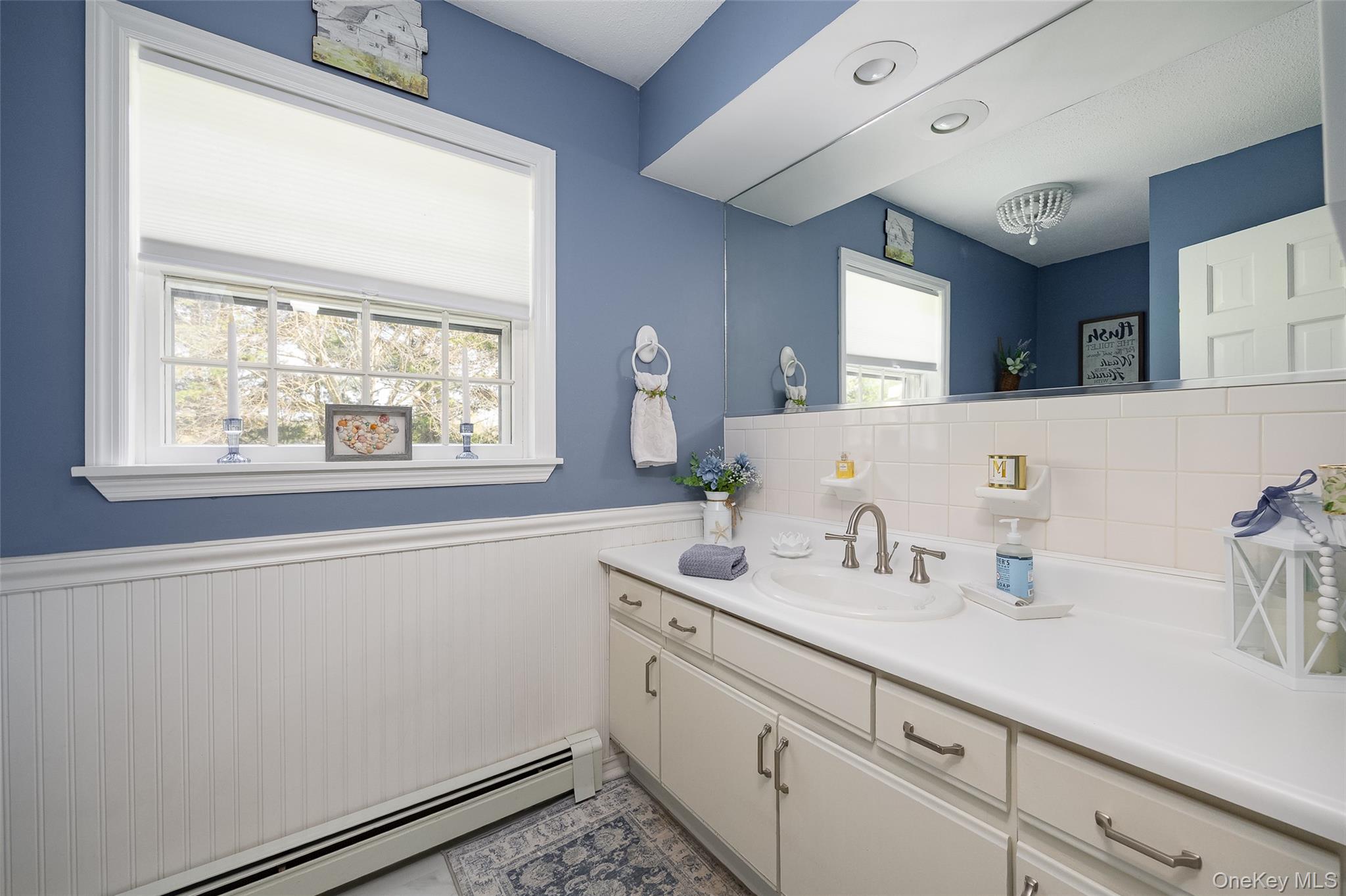 6 Grapevine Place Poughkeepsie, NY 12603 - Photo 11 of 24 a bathroom with a sink and a window
