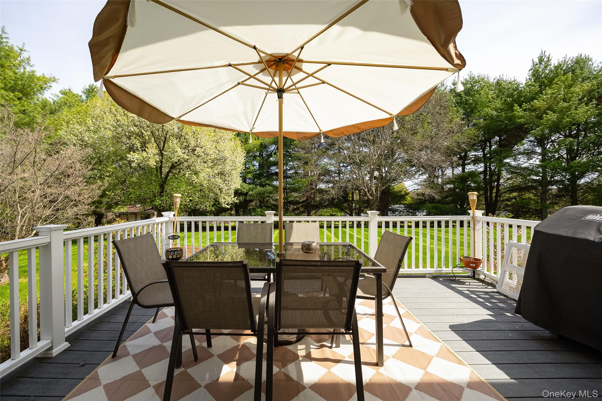 6 Grapevine Place Poughkeepsie, NY 12603 - Photo 18 of 24 a view of balcony with furniture and umbrella