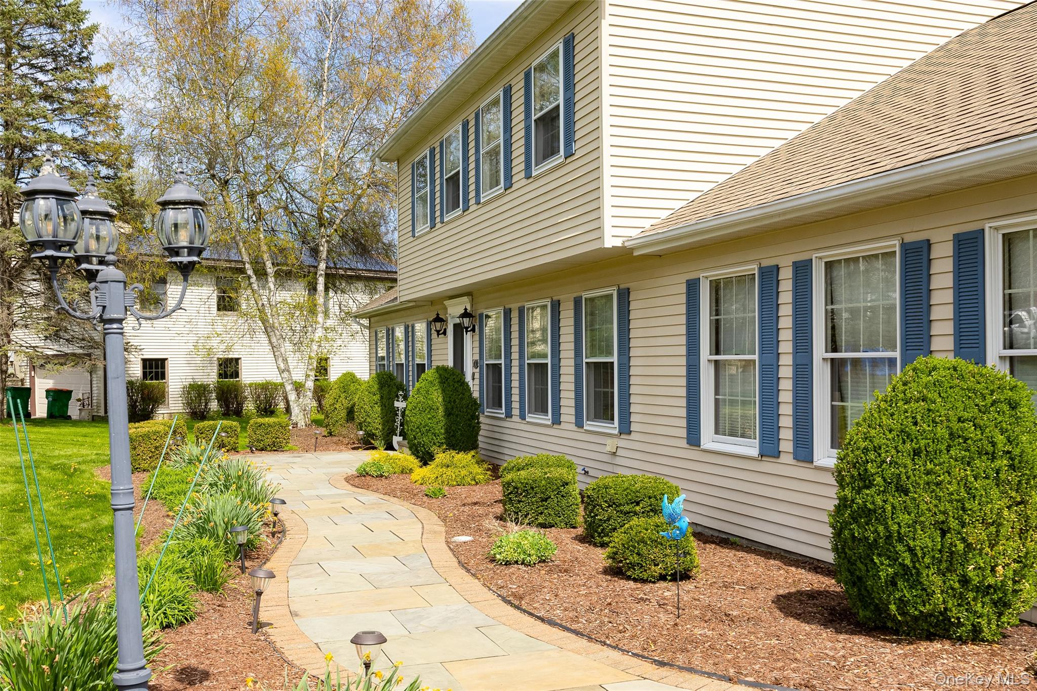 6 Grapevine Place Poughkeepsie, NY 12603 - Photo 2 of 24 a view of a house with sitting area and garden