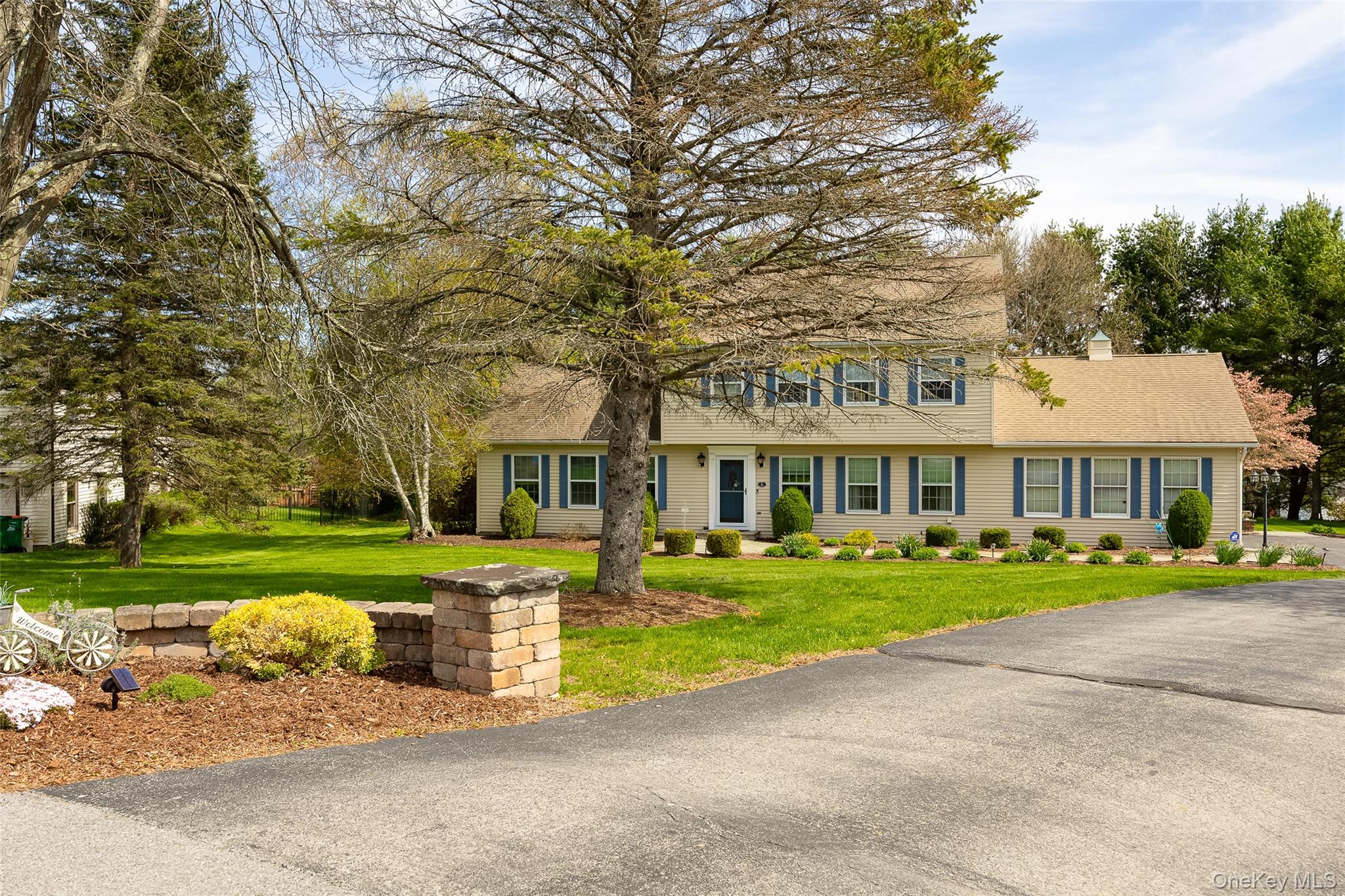 6 Grapevine Place Poughkeepsie, NY 12603 - Photo 24 of 24 a front view of a house with a yard and trees