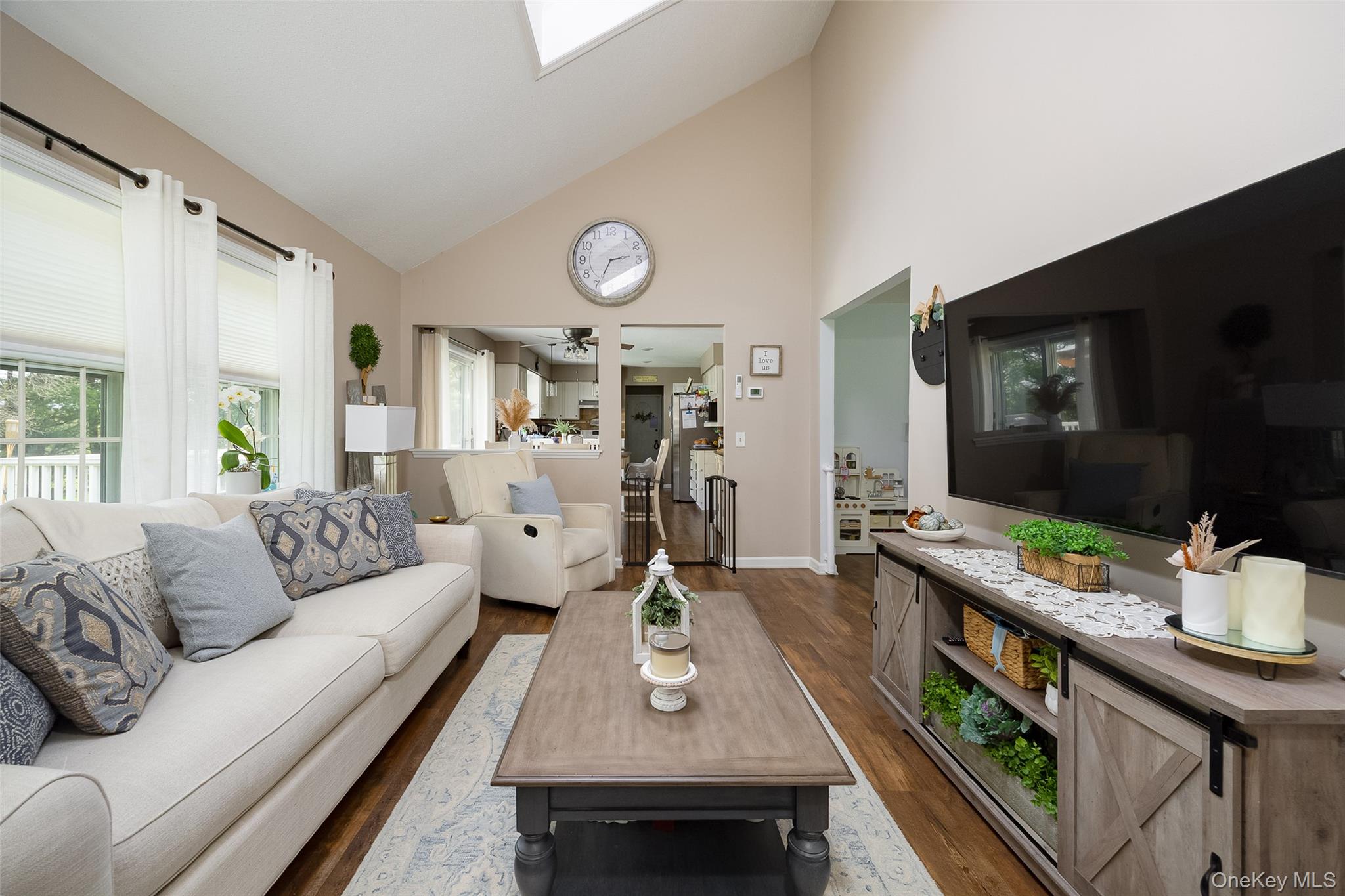6 Grapevine Place Poughkeepsie, NY 12603 - Photo 3 of 24 a living room with furniture flat screen tv and a large window