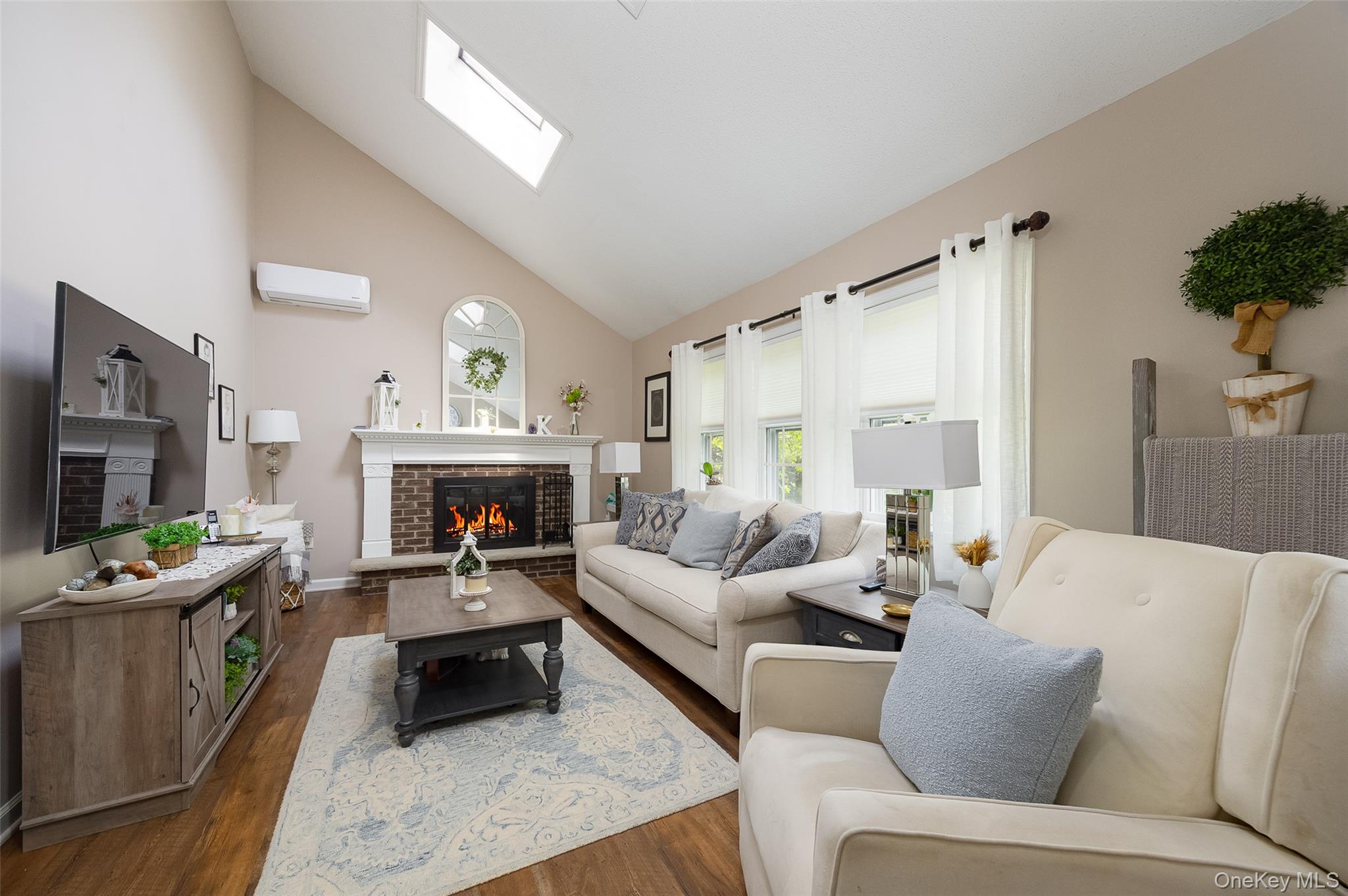 6 Grapevine Place Poughkeepsie, NY 12603 - Photo 4 of 24 a living room with furniture and a fireplace