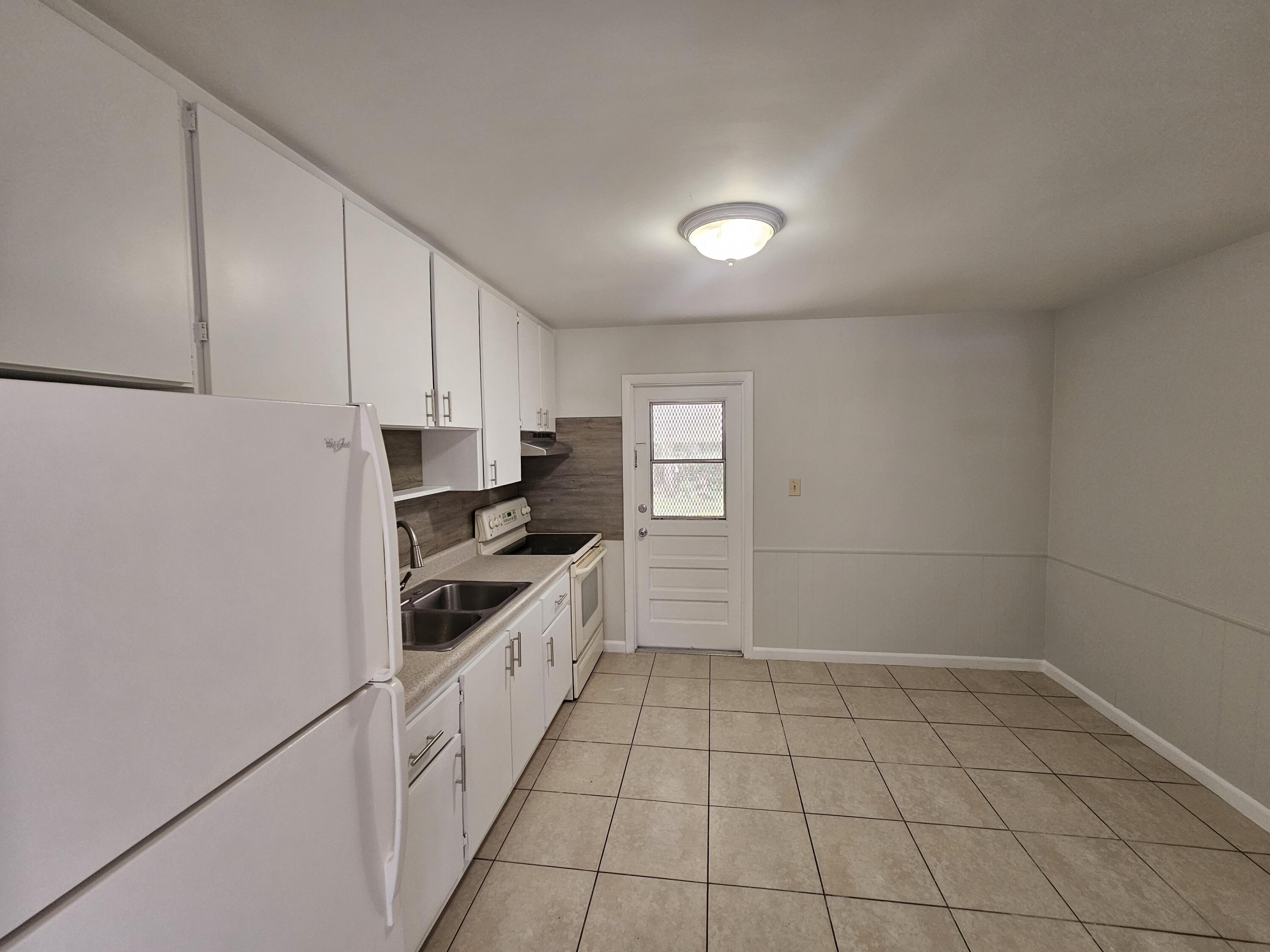 2031 Hugo Road Fort Pierce, FL 34946 - Photo 5 of 20 20260511_114855