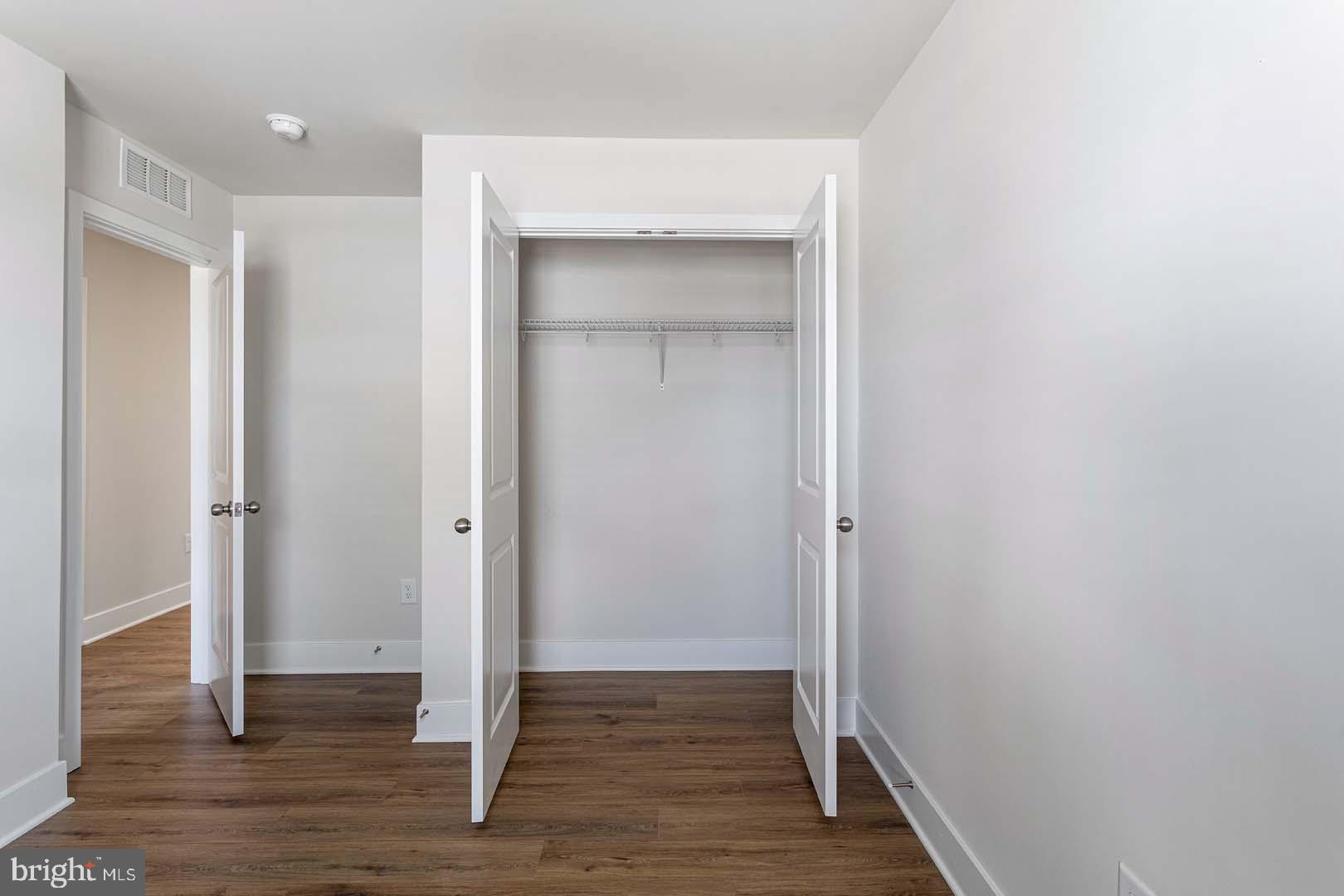 231 Matilda Frederick, MD 21701 - Photo 12 of 26 a view of empty room with wooden floor