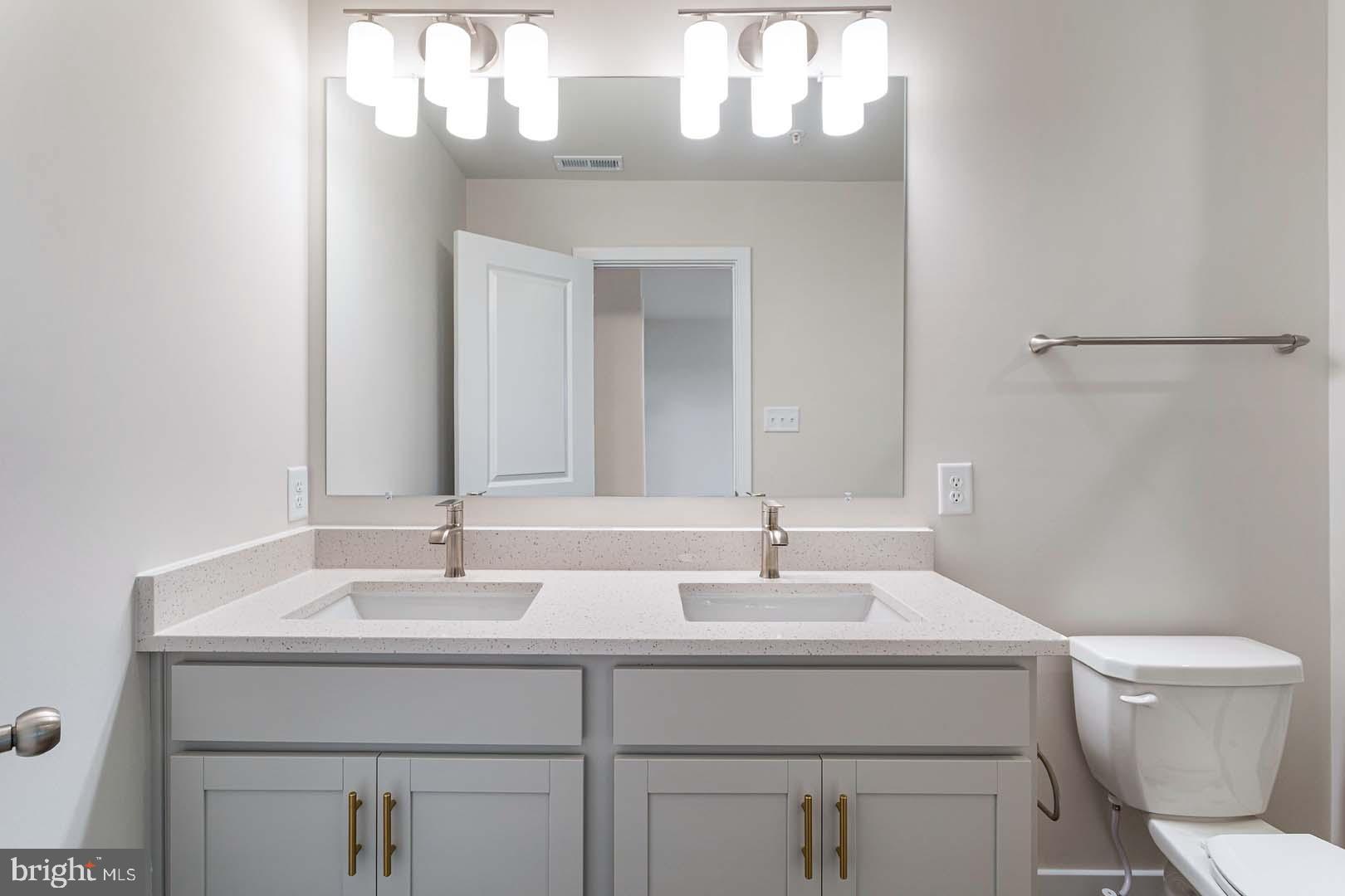 231 Matilda Frederick, MD 21701 - Photo 20 of 26 a bathroom with a sink and a mirror