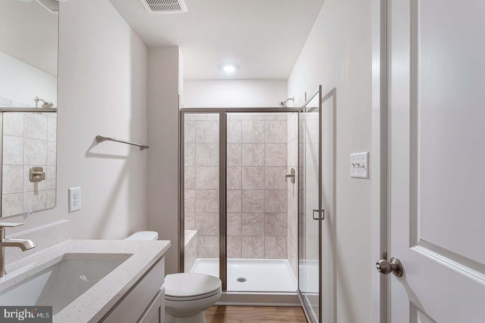 231 Matilda Frederick, MD 21701 - Photo 21 of 26 a bathroom with a sink toilet and shower