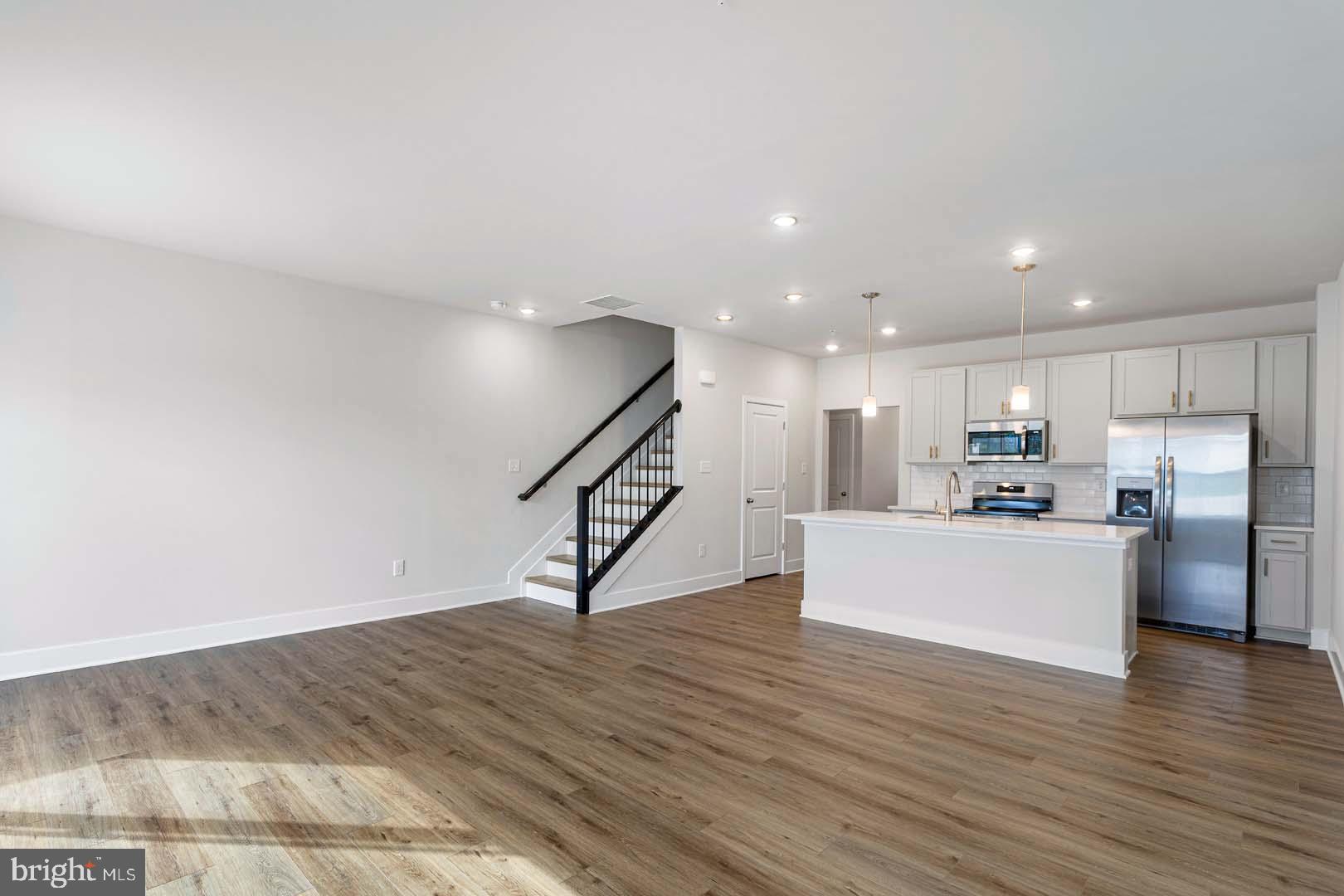 231 Matilda Frederick, MD 21701 - Photo 4 of 26 a view of kitchen with furniture and wooden floor