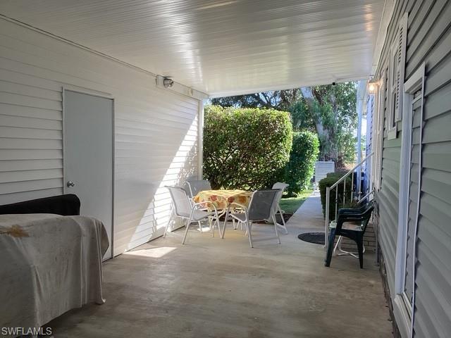 225 Belle Isle Circle Naples, FL 34112 - Photo 28 of 48 a outdoor space with furniture