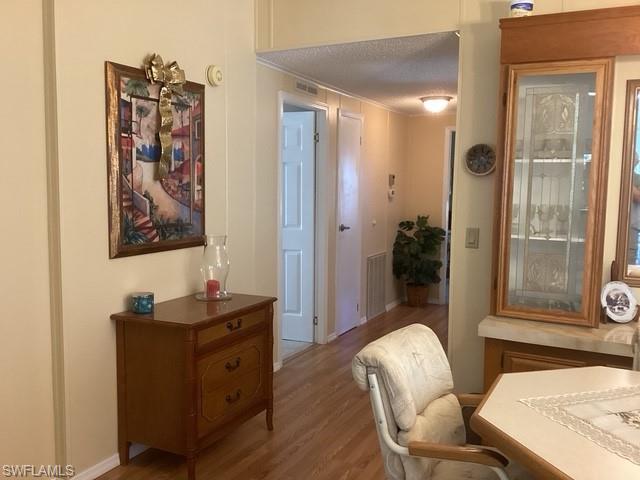 225 Belle Isle Circle Naples, FL 34112 - Photo 9 of 48 a workspace with furniture and window