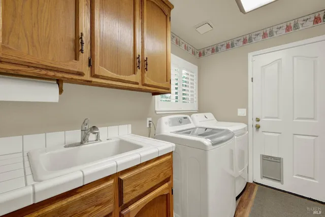 a bedroom with a bed and a chair