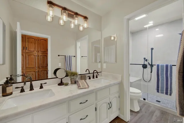 a view of a city with mountains in the background