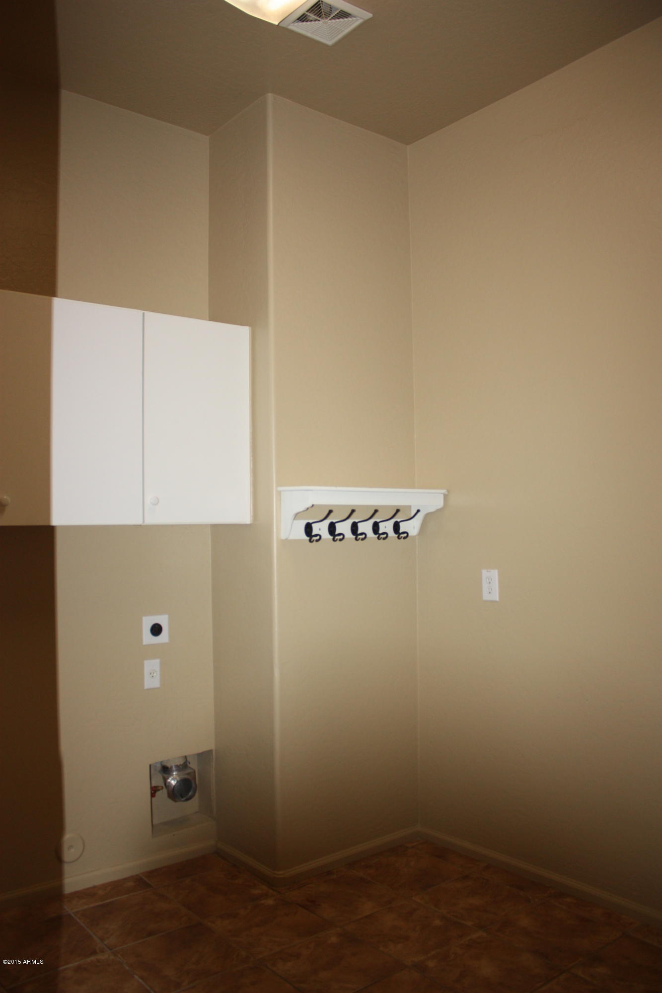 4232 East Buckboard Road Gilbert, AZ 85297 - Photo 21 of 35 4232 Buckboard Laundry Room 1.JPG