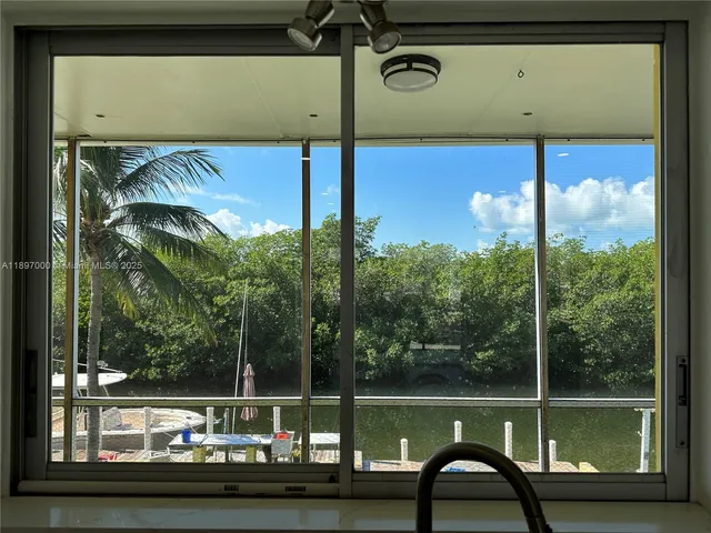 a bathroom with a shower and a toilet