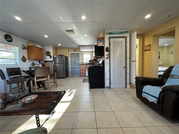 a kitchen with stainless steel appliances granite countertop sink stove top oven and cabinets