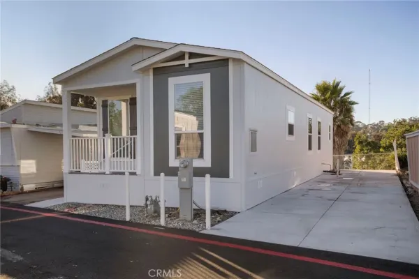 a front view of a house with a garage