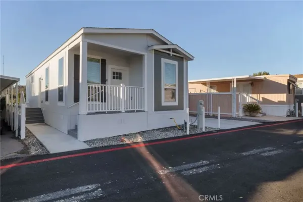 a view of a house with a street