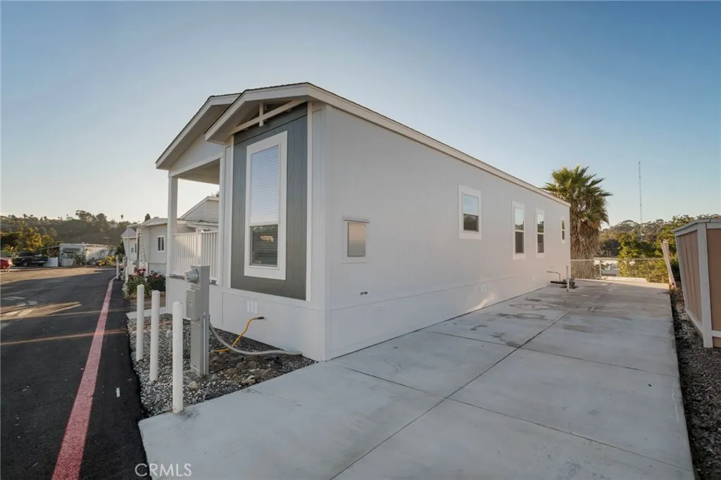 3030 Oceanside, Unit 44 Oceanside, CA 92054 - Photo 5 of 40 a view of a house with backyard