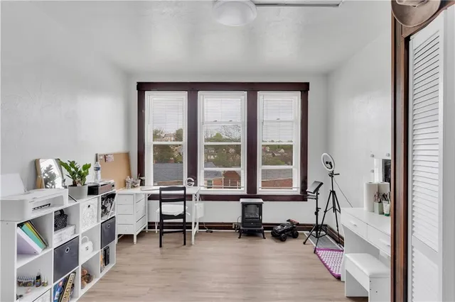 a kitchen with stainless steel appliances a sink stove and cabinets