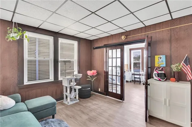 a living room with furniture and windows