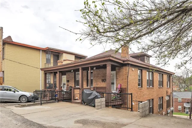a car parked in front of a house