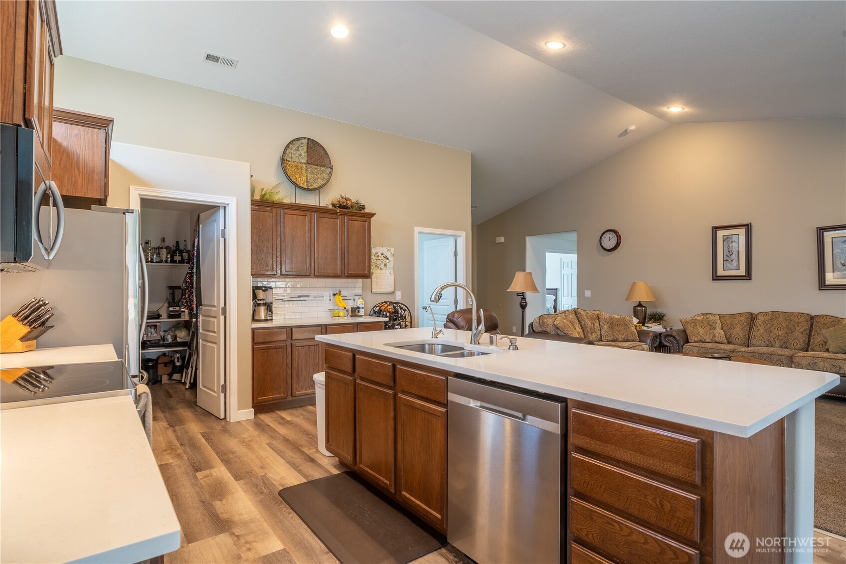 1630 Filmore Drive Moses Lake, WA 98837 - Photo 11 of 40 a kitchen with a sink and cabinets