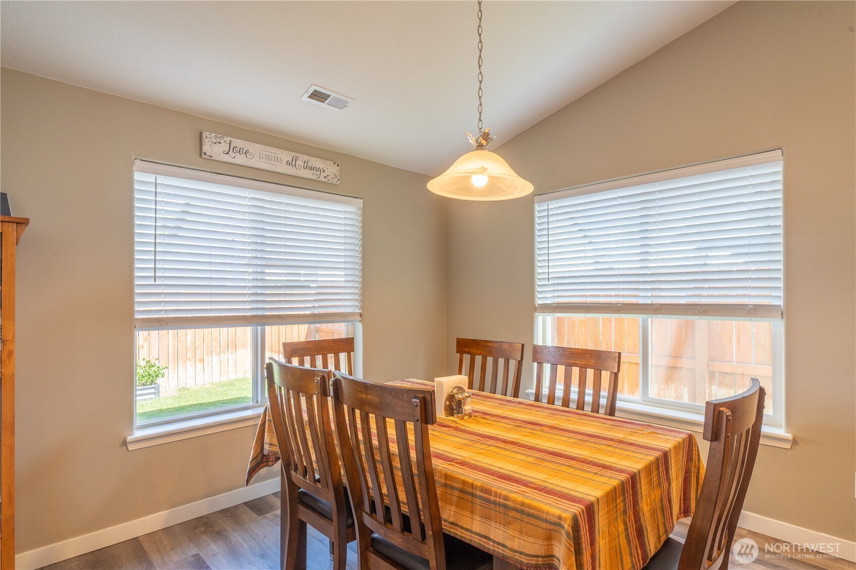 1630 Filmore Drive Moses Lake, WA 98837 - Photo 14 of 40 a view of a dining room with furniture and wooden floor