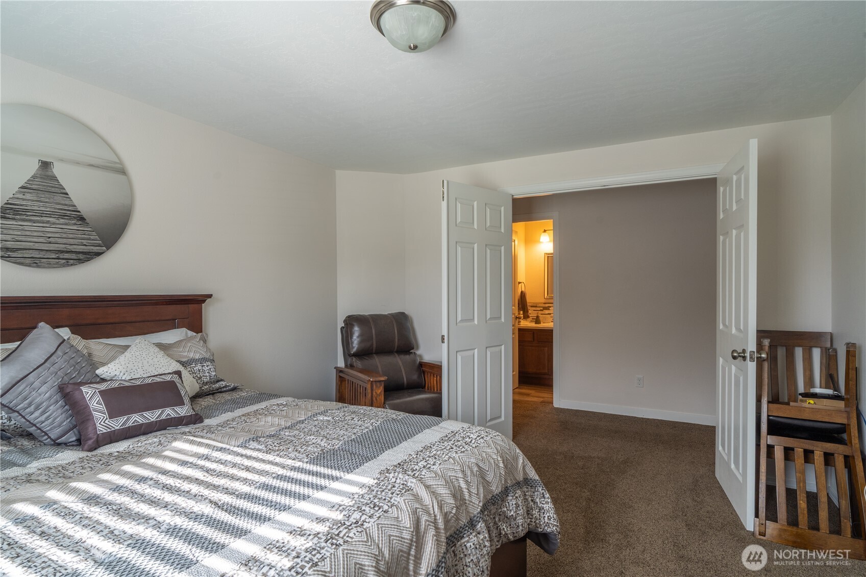 1630 Filmore Drive Moses Lake, WA 98837 - Photo 19 of 40 a bedroom with a bed and closet