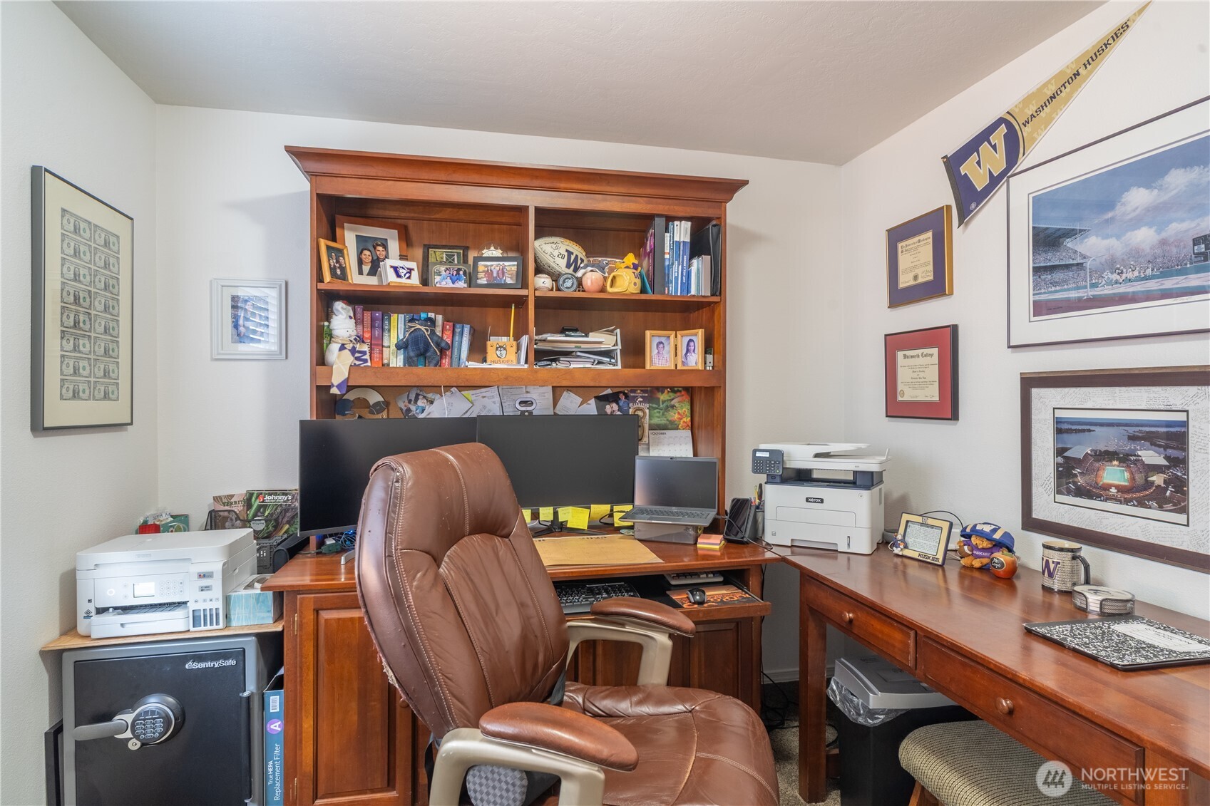 1630 Filmore Drive Moses Lake, WA 98837 - Photo 30 of 40 a work room with furniture and a bookshelf