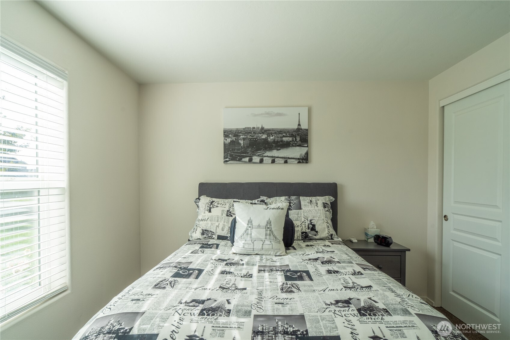 1630 Filmore Drive Moses Lake, WA 98837 - Photo 34 of 40 a bed sitting in a bedroom next to a window