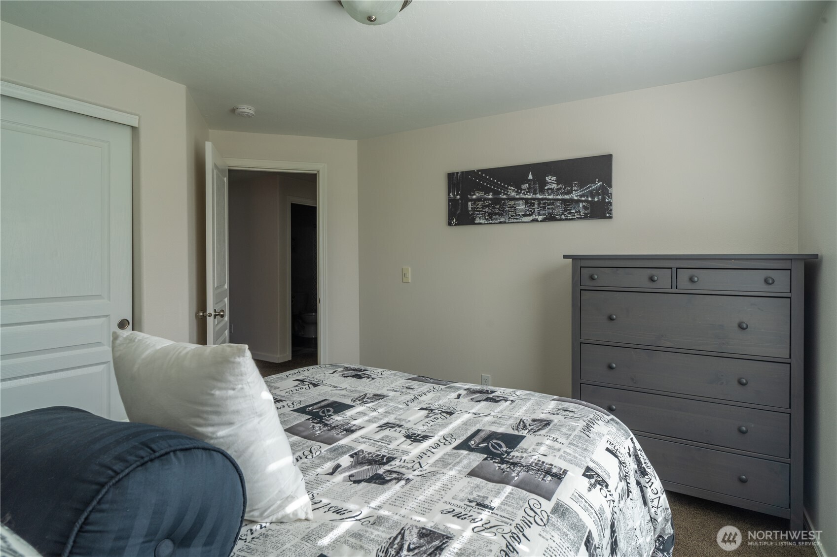 1630 Filmore Drive Moses Lake, WA 98837 - Photo 35 of 40 a bedroom with a bed and a dresser