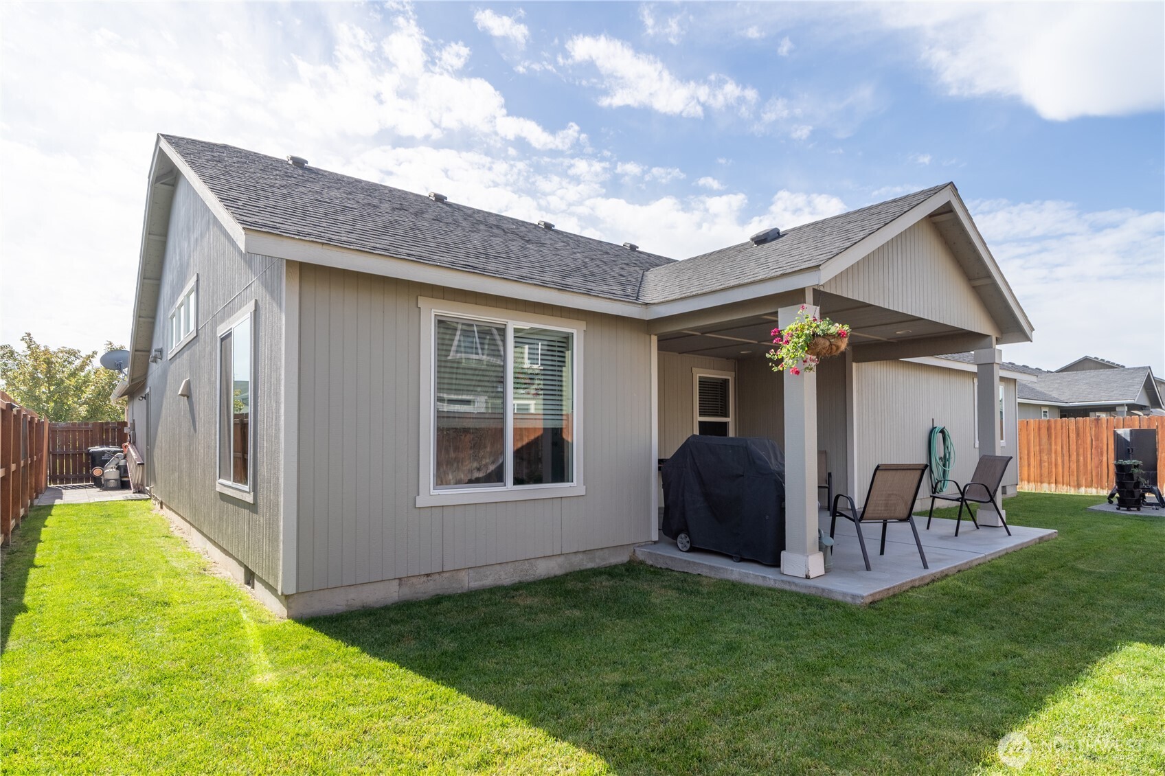 1630 Filmore Drive Moses Lake, WA 98837 - Photo 37 of 40 a view of an house with backyard and patio