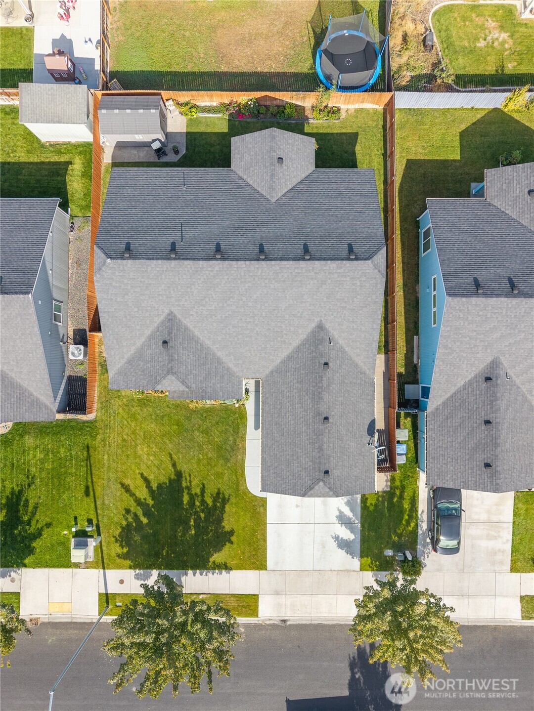 1630 Filmore Drive Moses Lake, WA 98837 - Photo 39 of 40 an aerial view of a house with a swimming pool