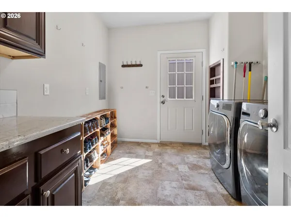 a view of kitchen with furniture and wooden floor