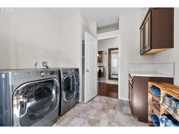 a utility room with dryer and washer