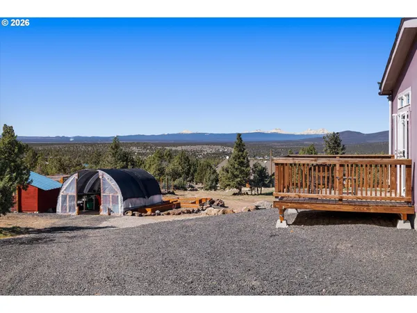a backyard of a house with seating space