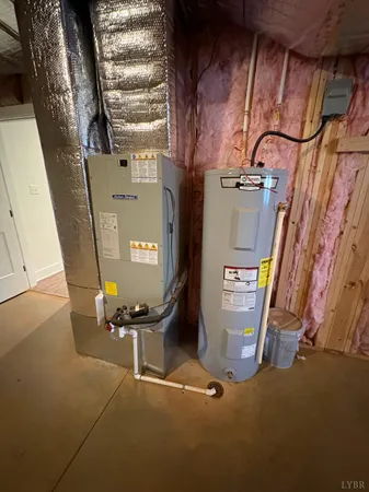 a view of a lake with sunset in background